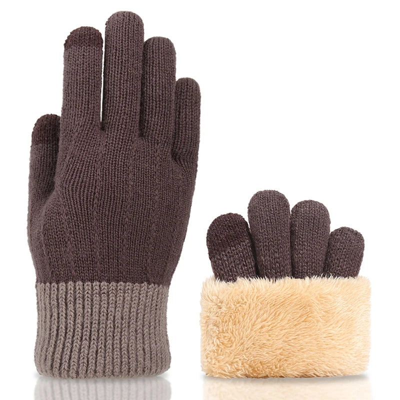 a pair of gloves sitting next to each other