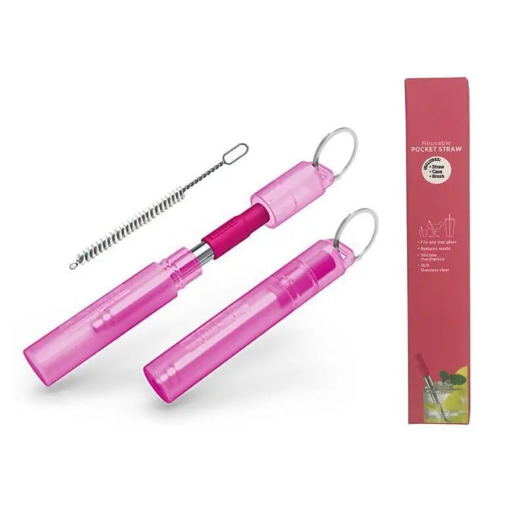 a pair of pink scissors next to a pink box