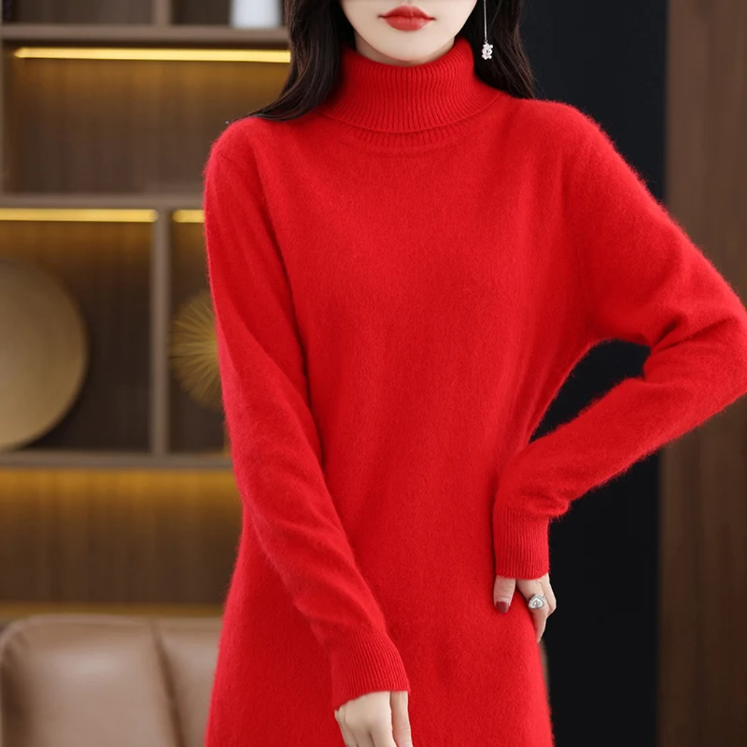 a woman in a red sweater dress posing for a picture