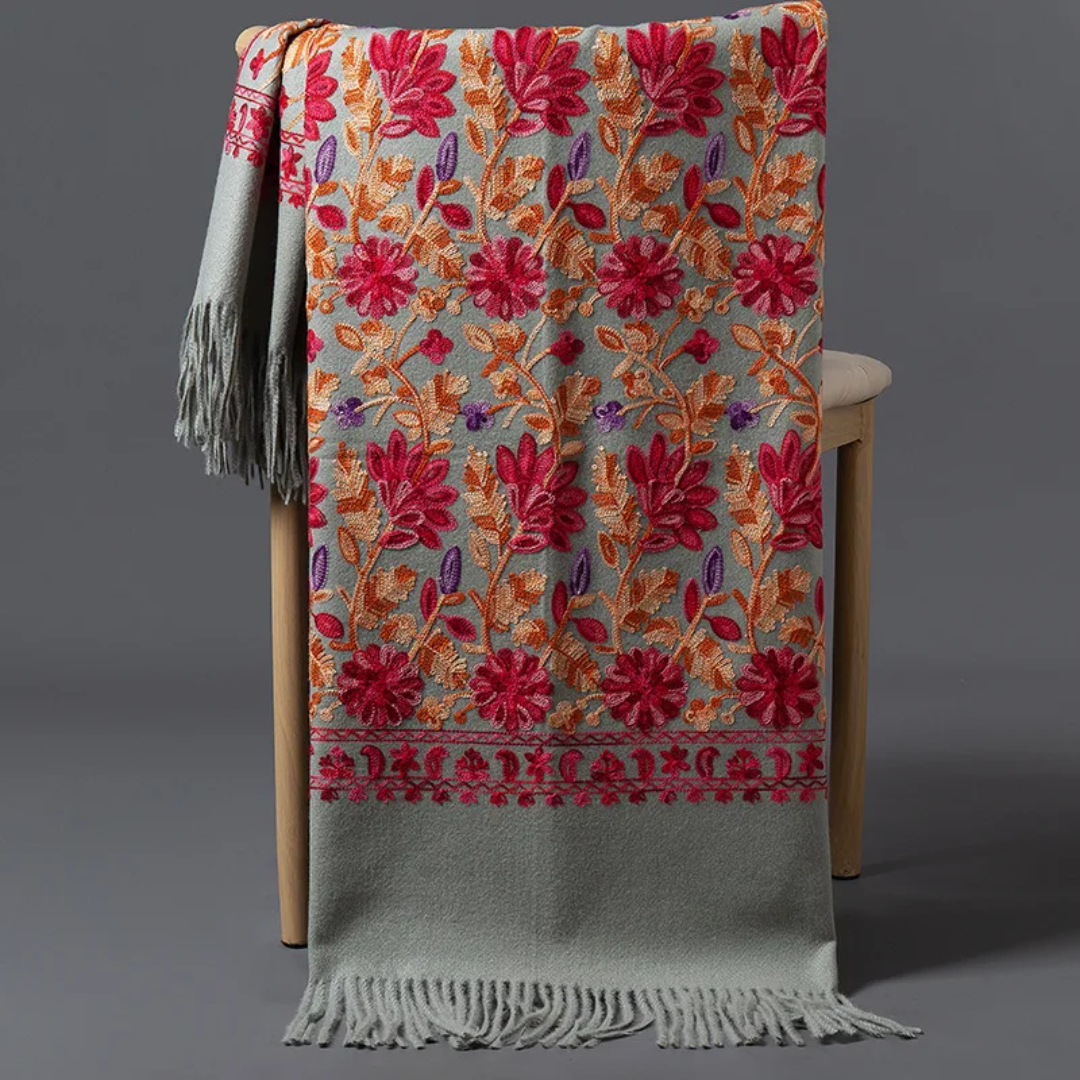 a chair with a blanket on top of it