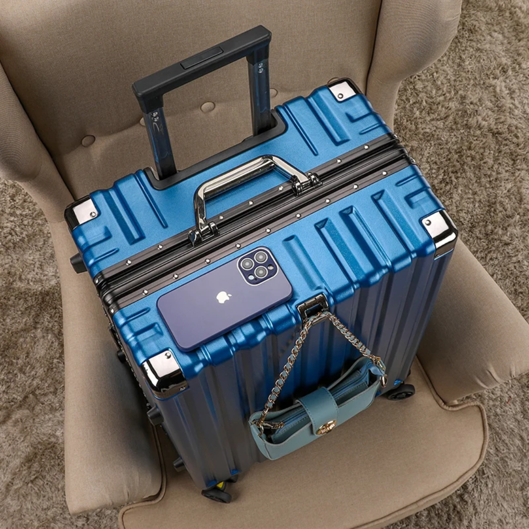 a blue suitcase sitting on top of a chair
