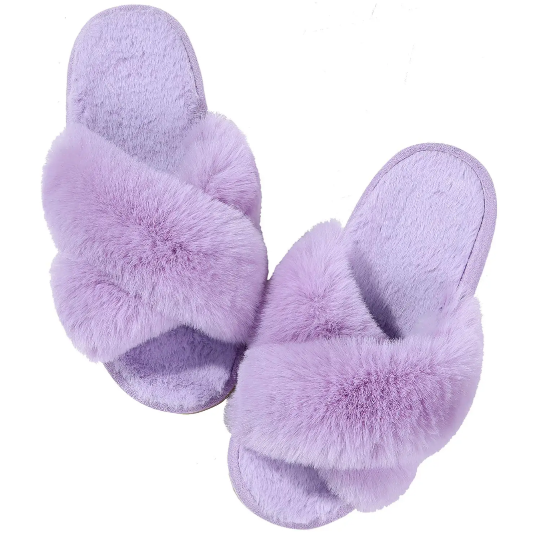 a pair of purple slippers on a white background