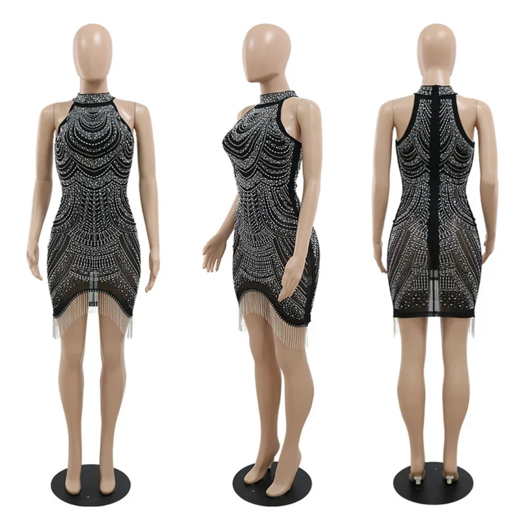 a mannequin wearing a black and silver dress