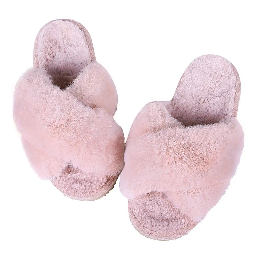 a pair of pink slippers on a white background