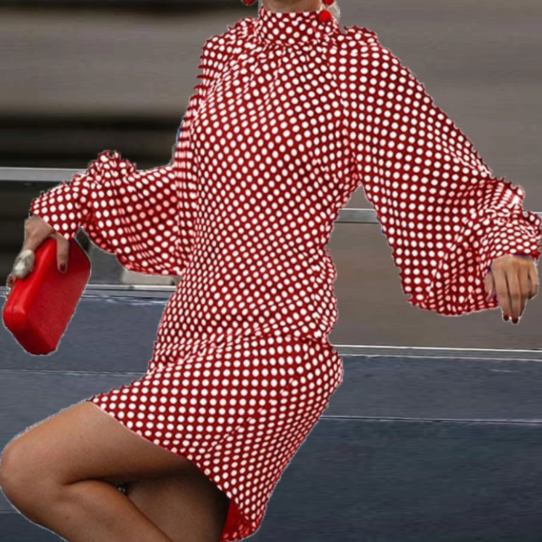 a woman in a red and white checkered dress
