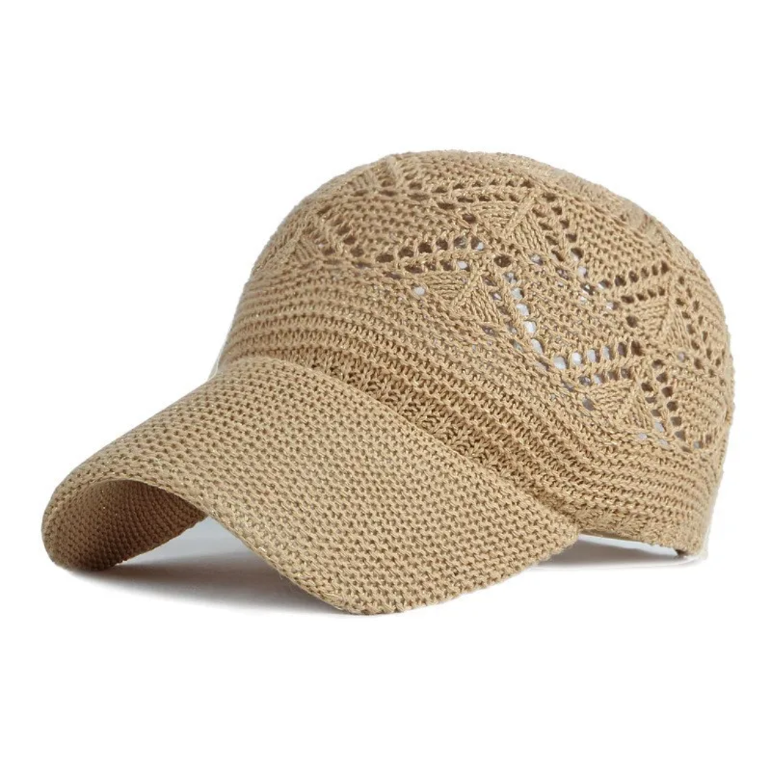 a beige hat with a crochet pattern on it