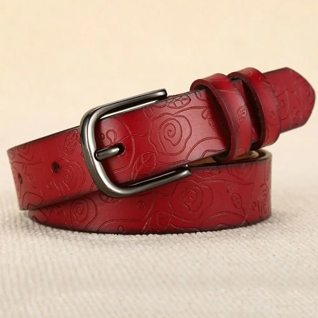 a red leather belt with a metal buckle