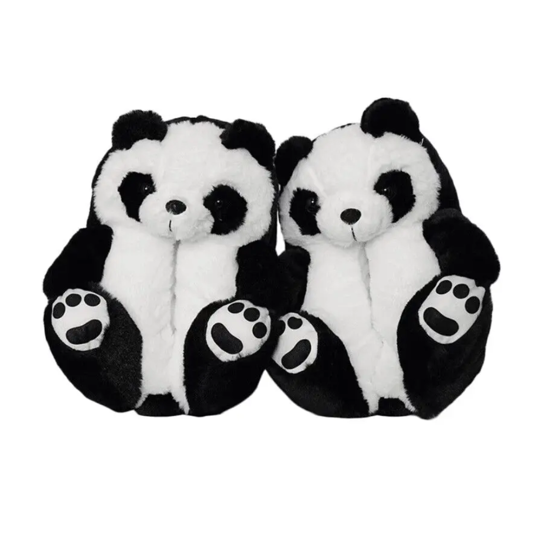 a pair of black and white panda bear slippers