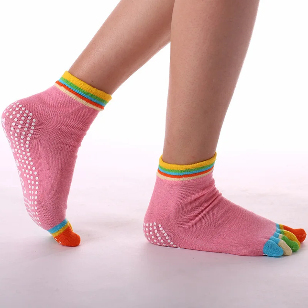 a person wearing pink socks and colorful socks