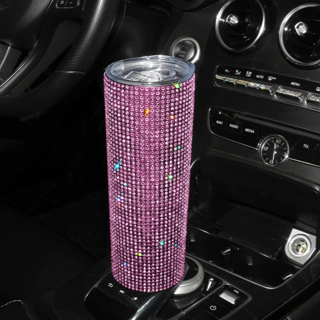 a car dashboard with a pink speaker in it