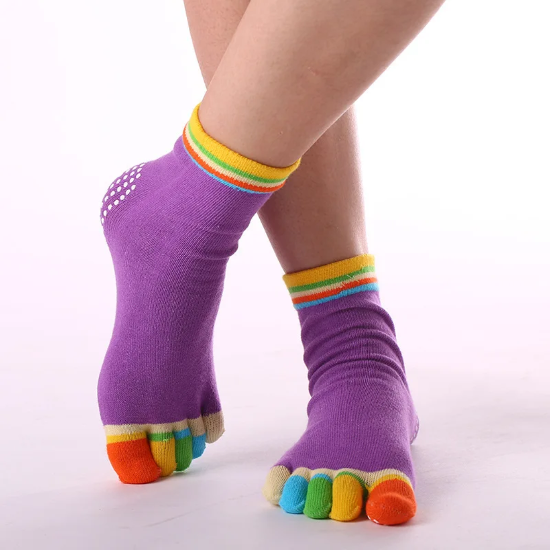 a woman's feet with colorful socks and socks